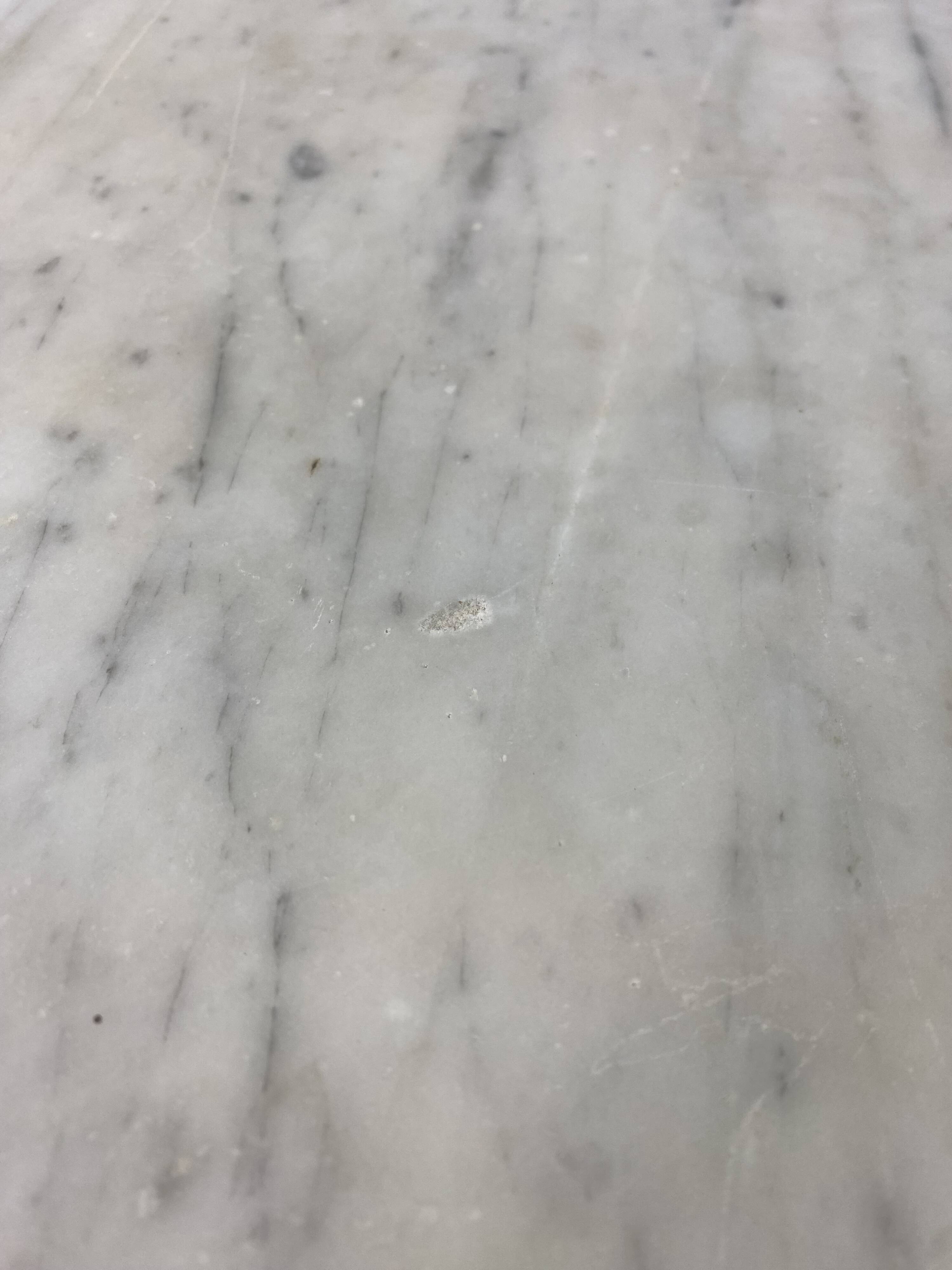 Set of two bistro tables in marble and wrought iron