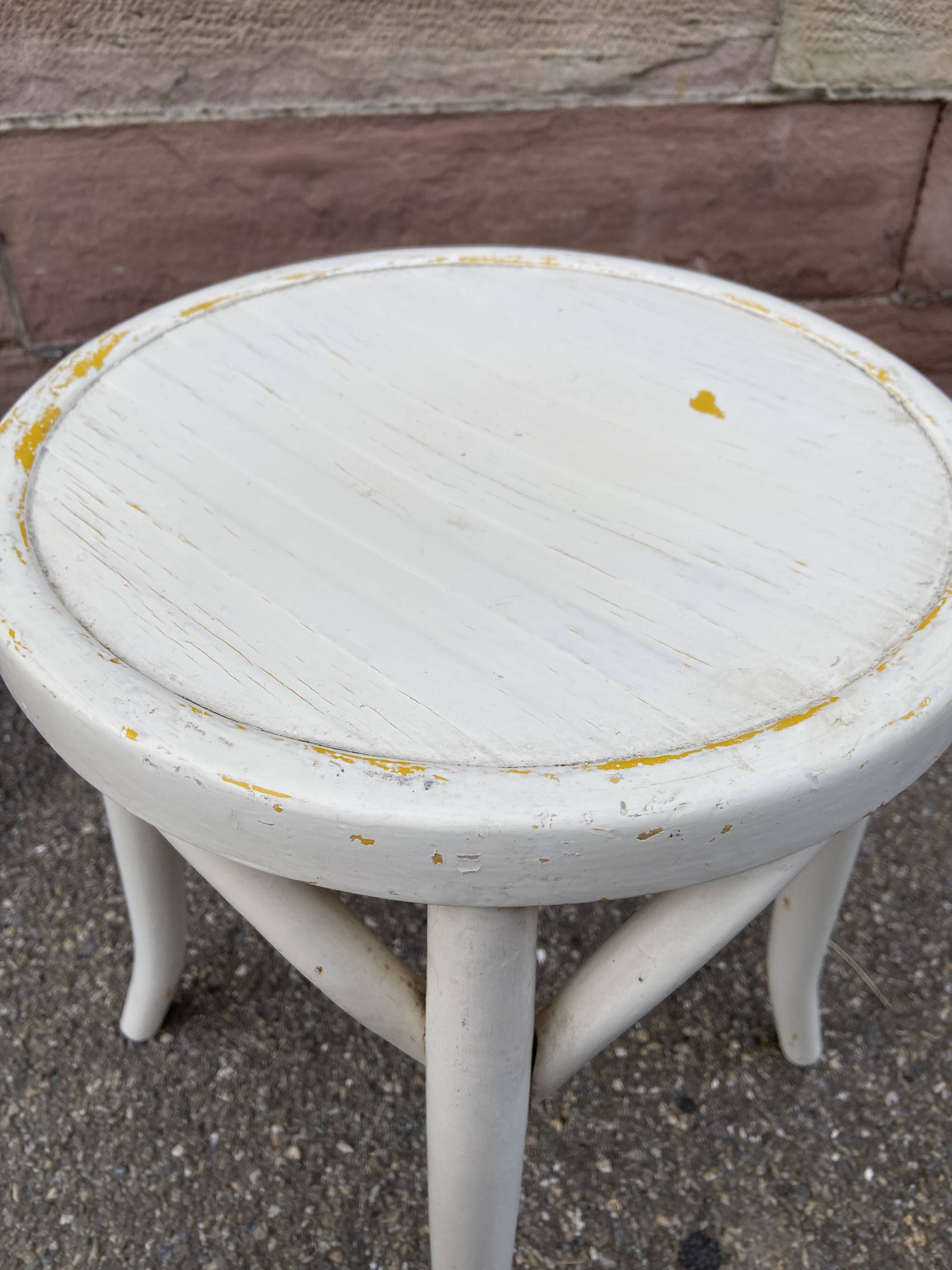 Vintage curved wooden stool