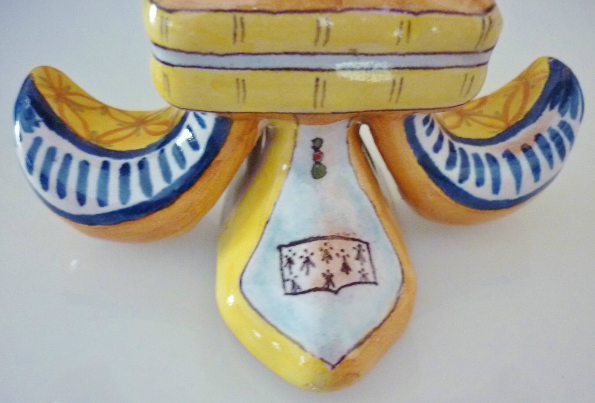 Fleur-de-lis shaped vase, glazed ceramic, Brittany, Quimper, Breton ermines, character