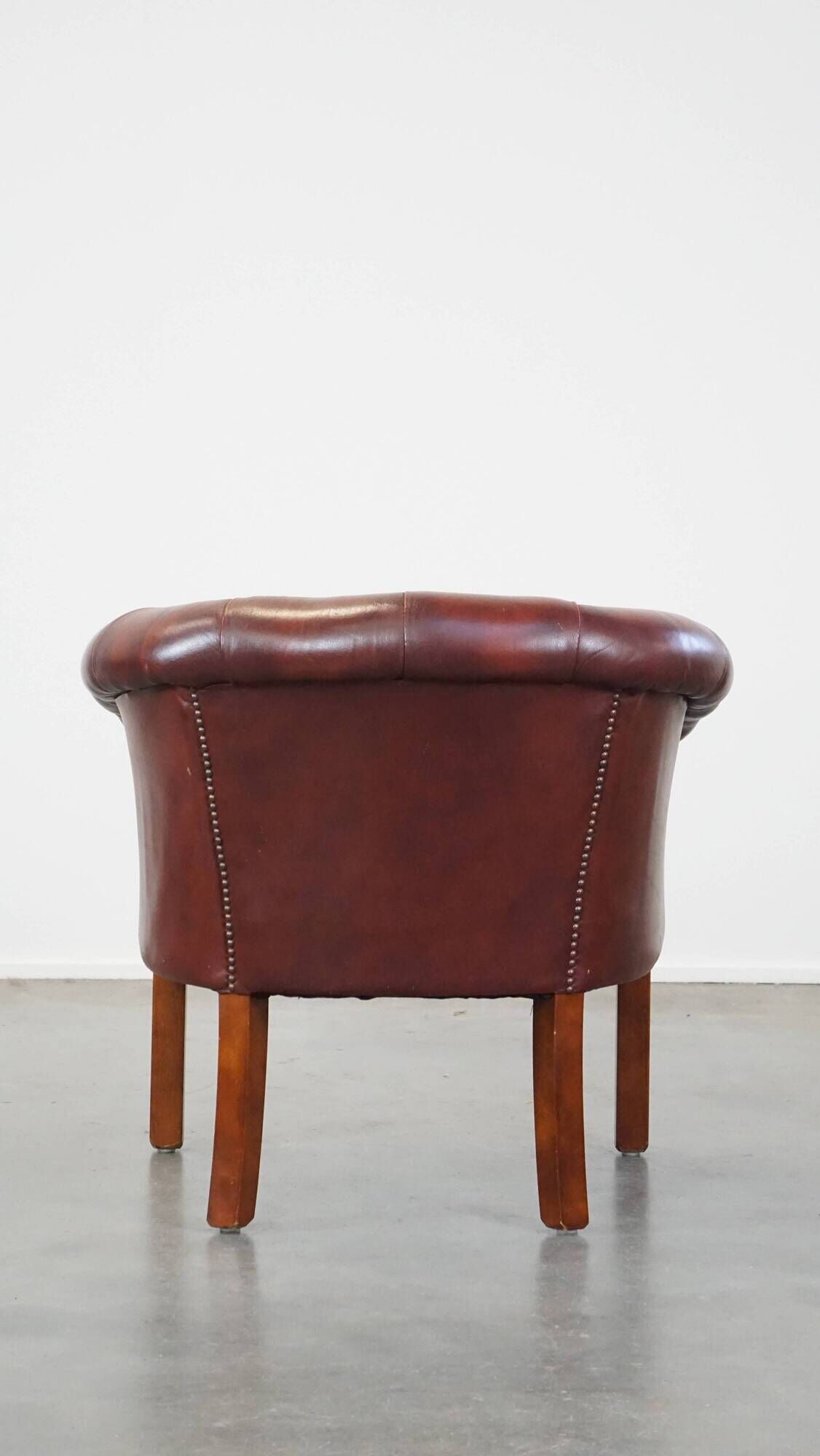 Red cow leather English chesterfield club chair