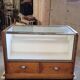 Shop counter display cabinet with old drawers, 1900s