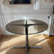 Dining table in metal and smoked glass Roche Bobois