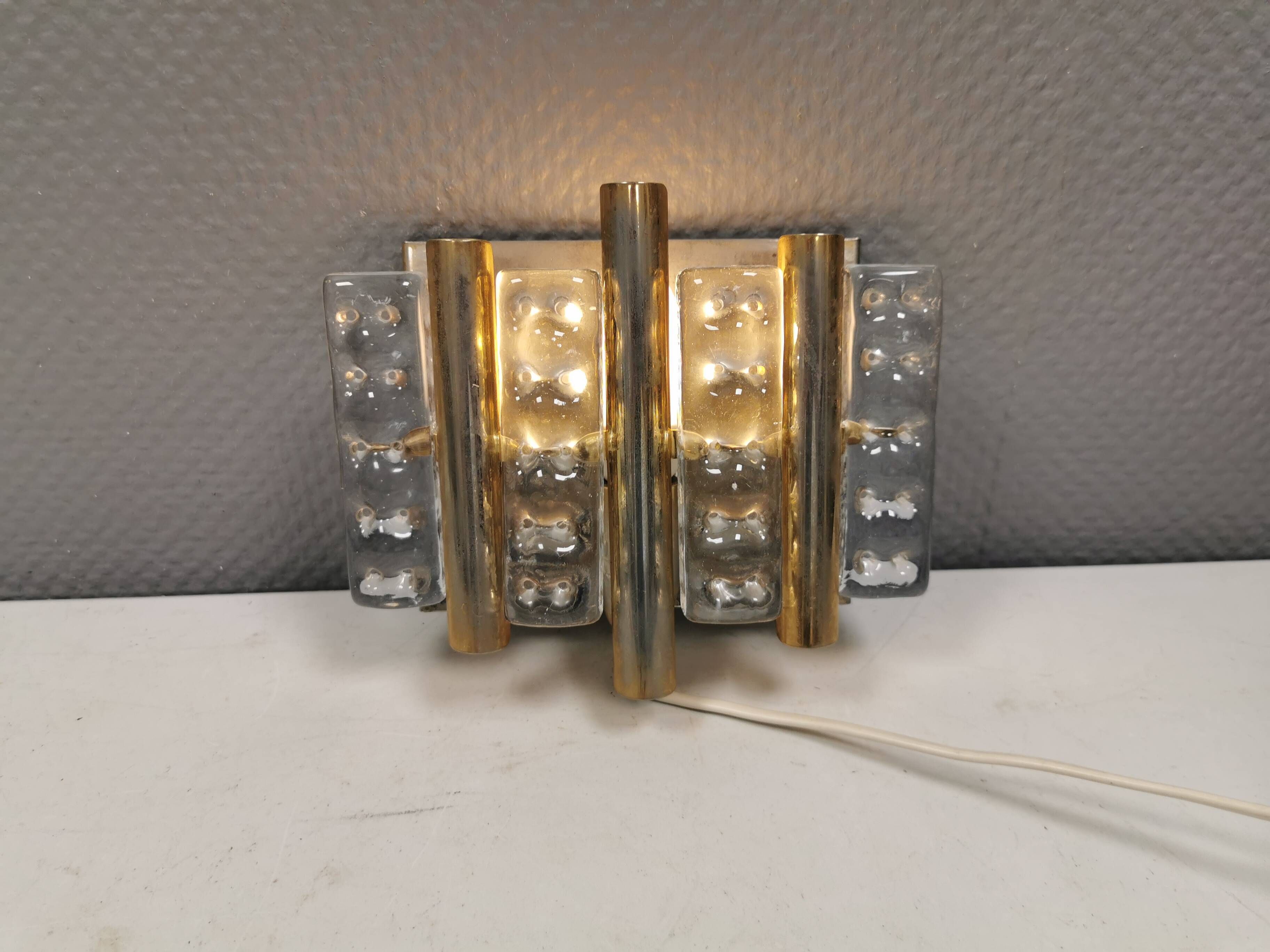Old Swedish wall lamp, made of hard pressed glass, brass and metal 1960s