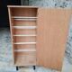 Small vintage Scandinavian shoe cabinet with 1 door.