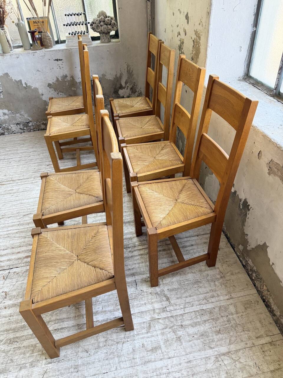 Set of 8 blond oak chairs with straw seats