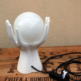 Hand-shaped lamp and opaline globe