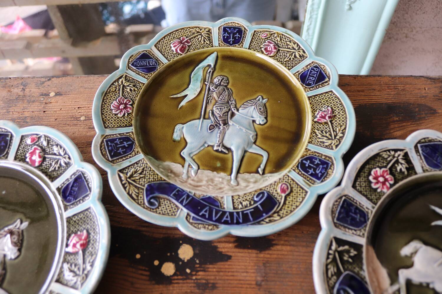 3 antique barbotine plates featuring Joan of Arc "En Avant"