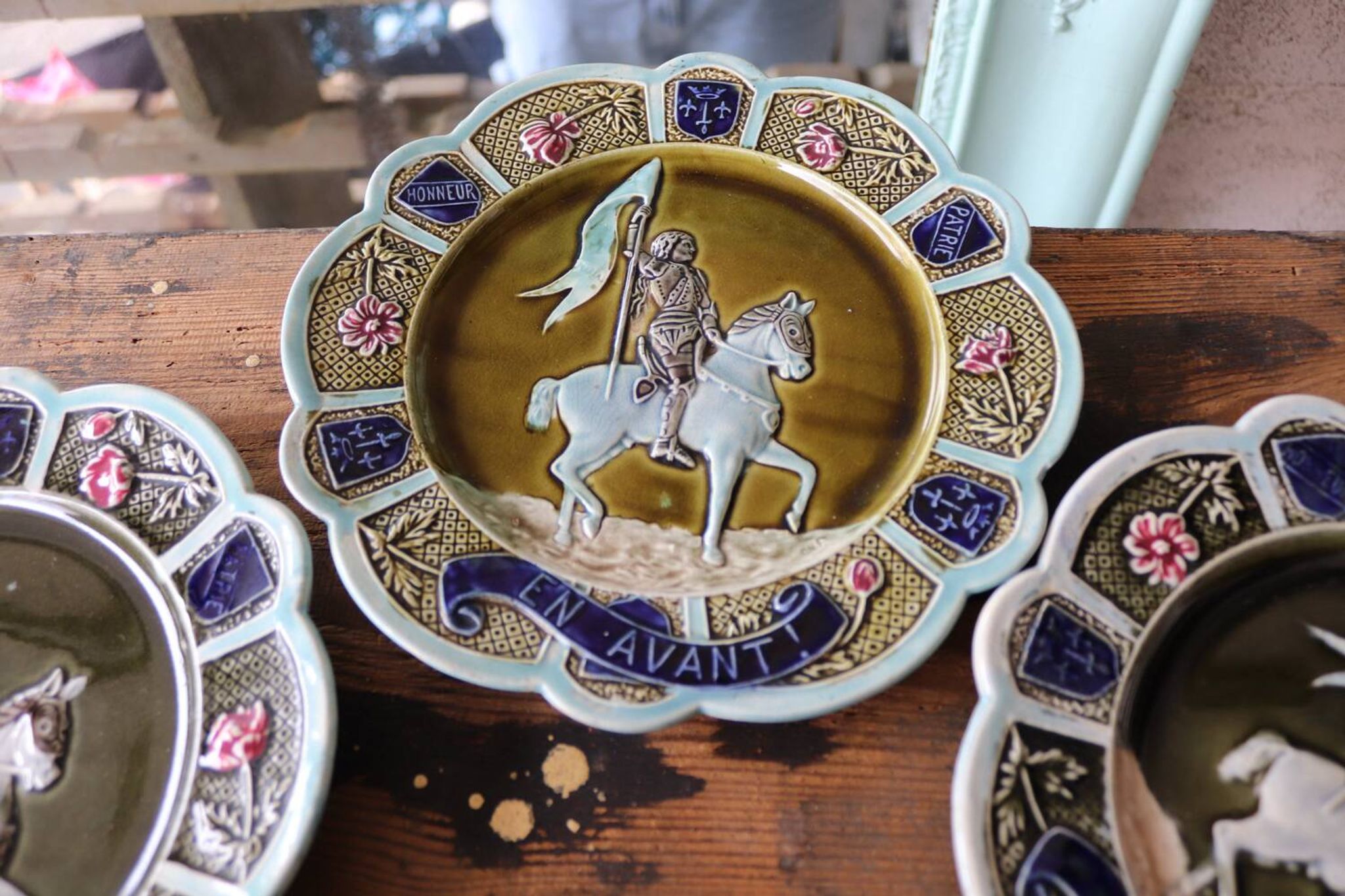 3 antique barbotine plates featuring Joan of Arc "En Avant"