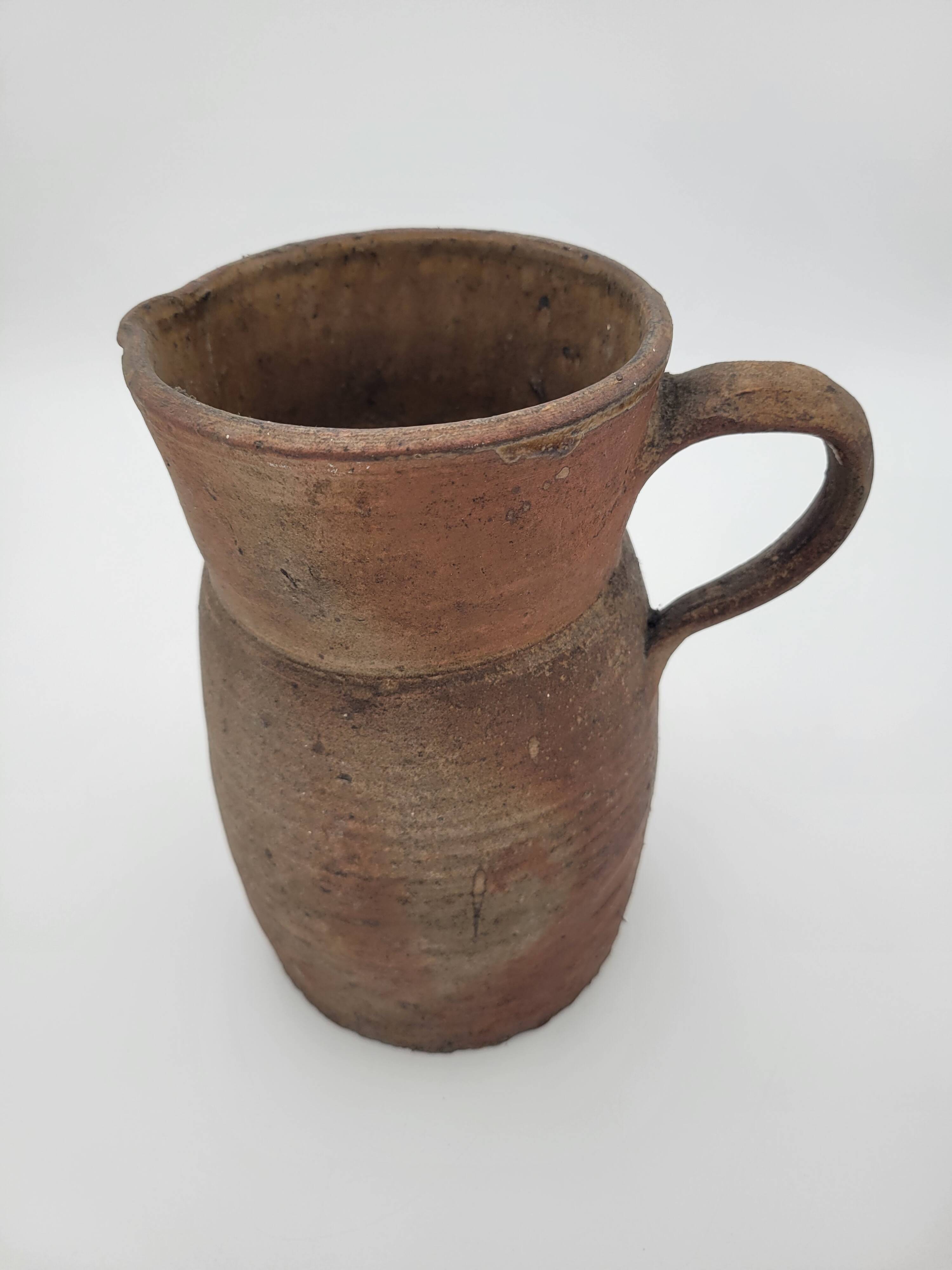 Pair of old terracotta pitchers