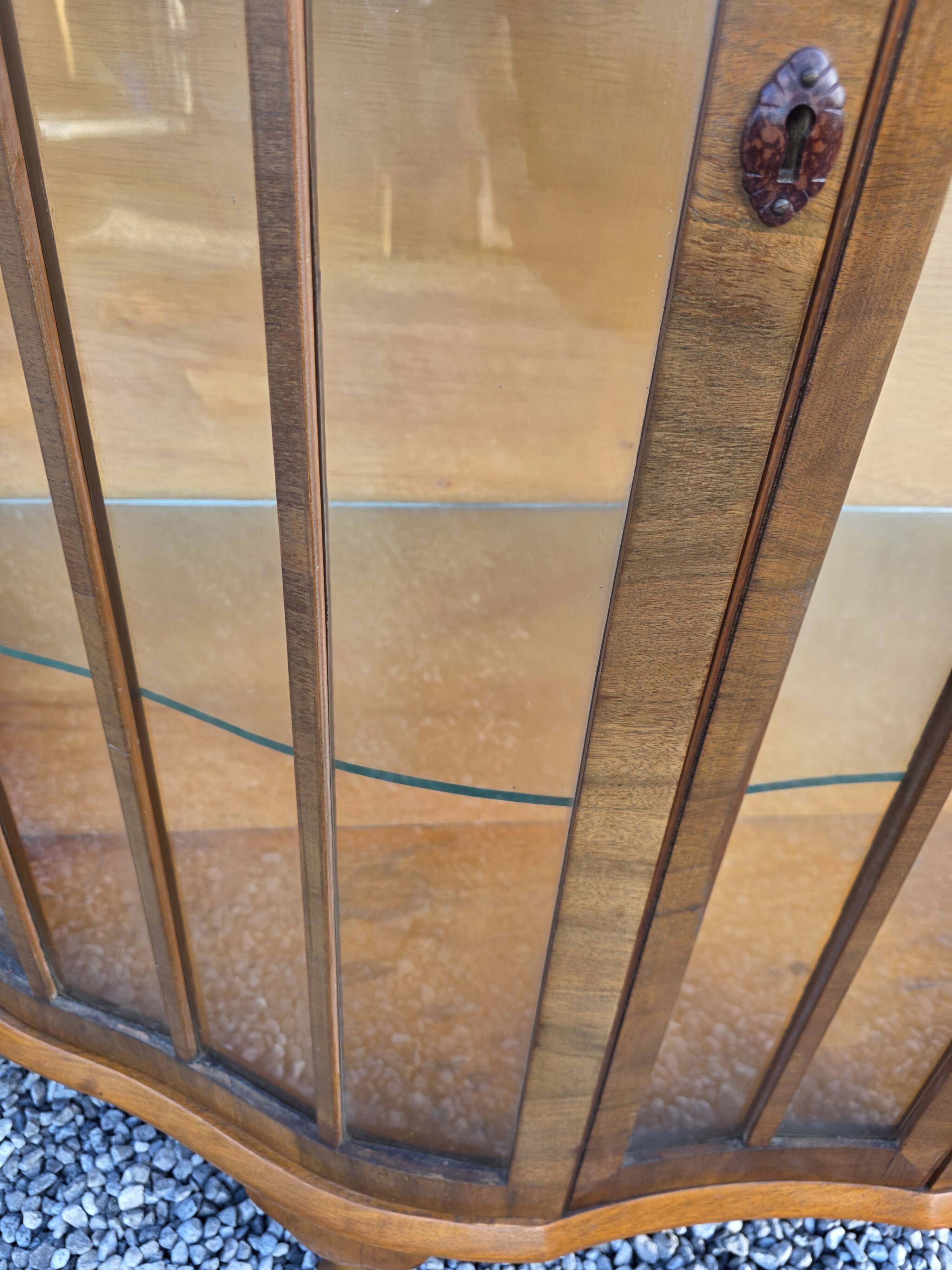 Art Deco display cabinet in walnut from the 1930s.