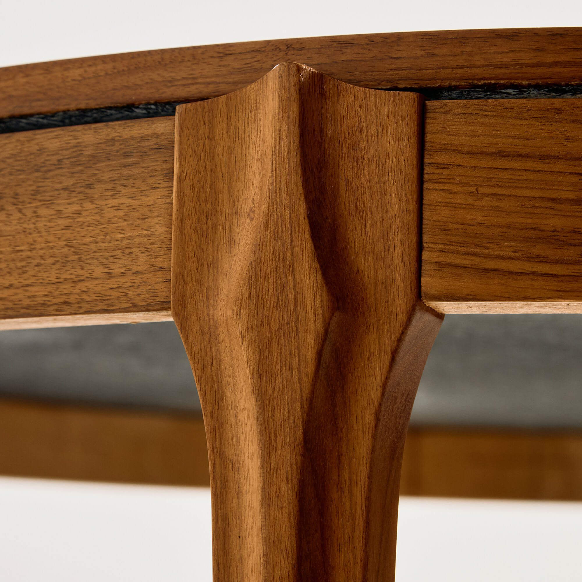 Coffee table in walnut with a ceramic top.