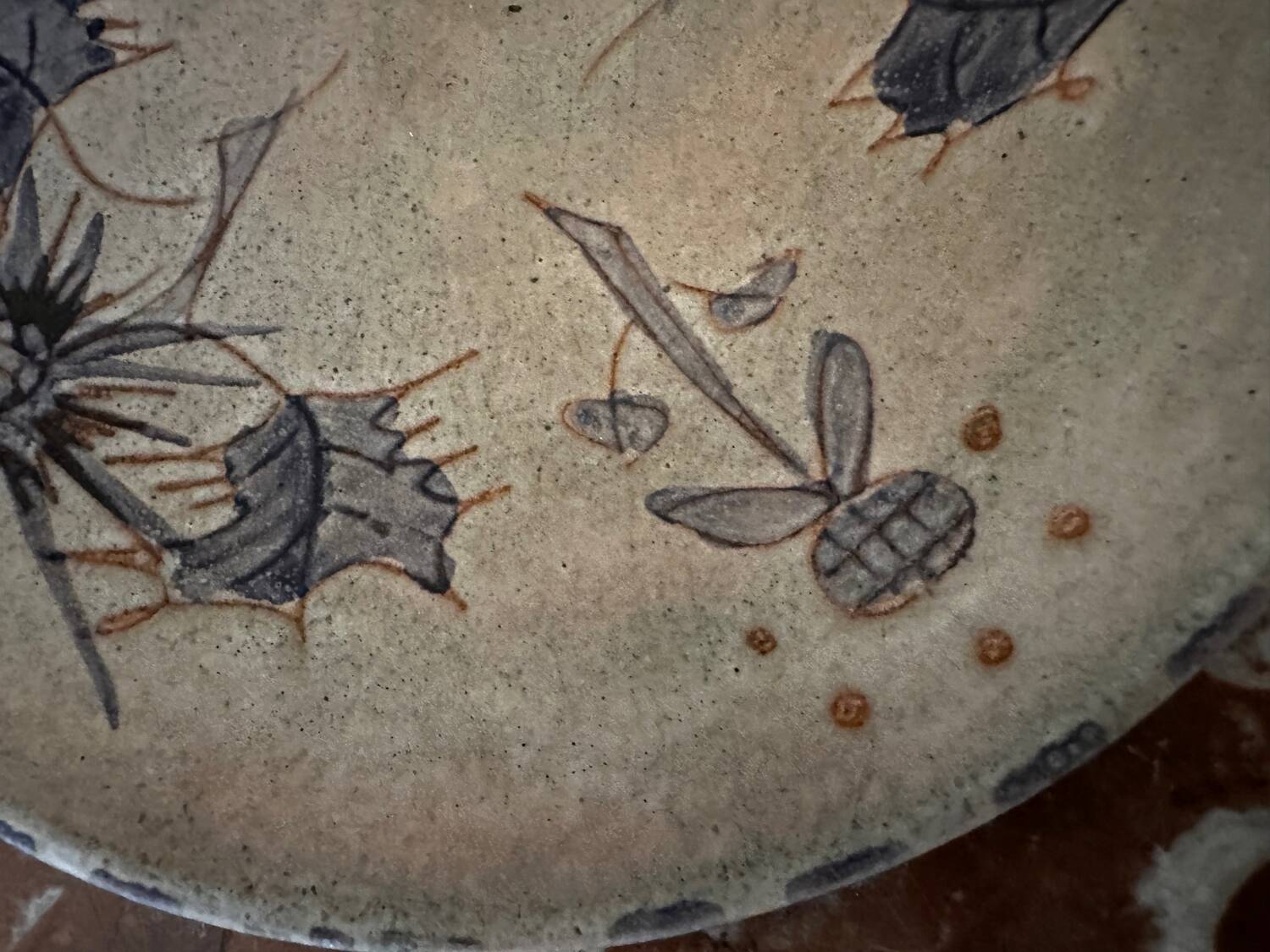 Ceramic plate signed by Marie-Madeleine Jolly – thistle decoration – year