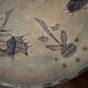 Ceramic plate signed by Marie-Madeleine Jolly – thistle decoration – year