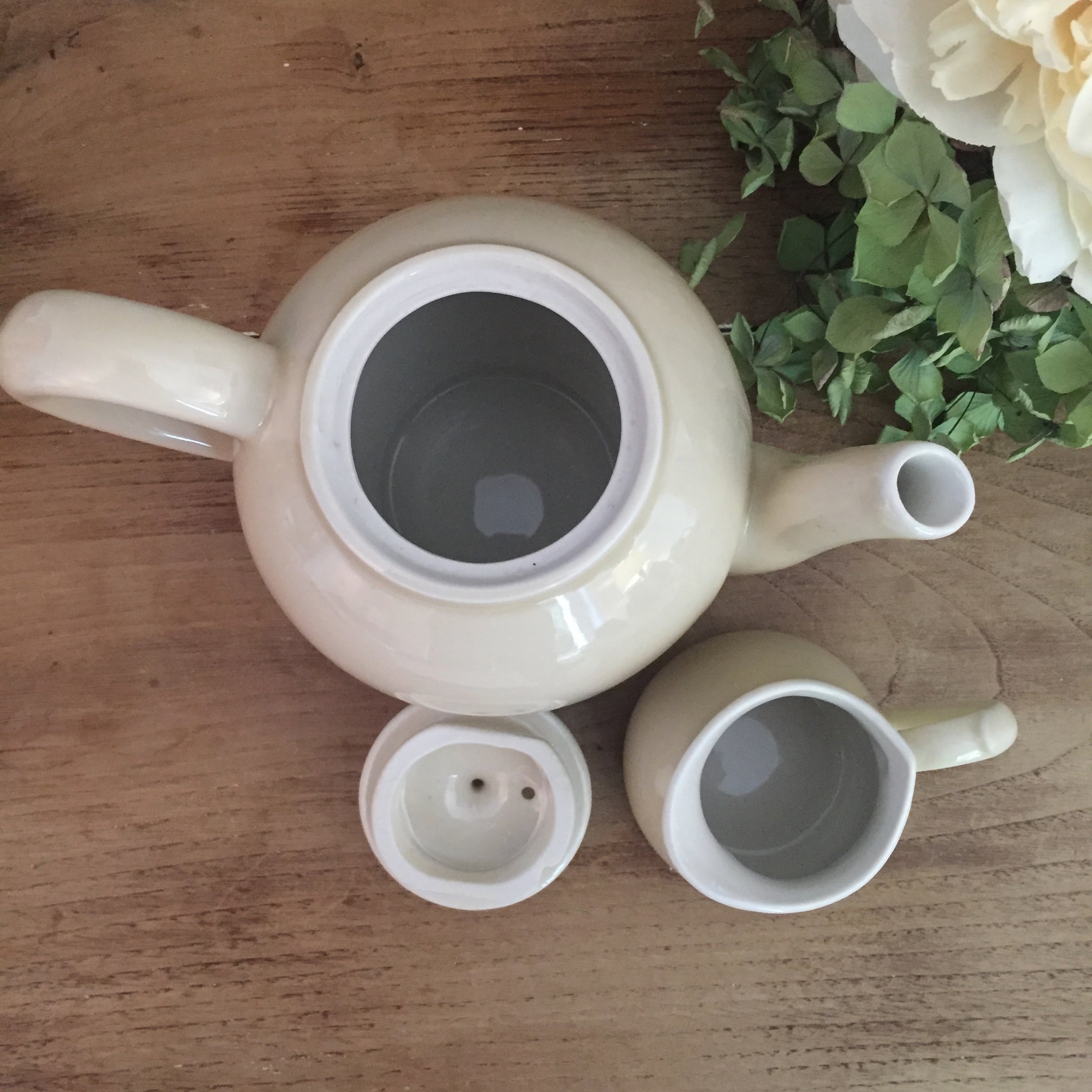 Teapot and vintage milk jar