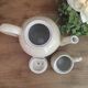 Teapot and vintage milk jar