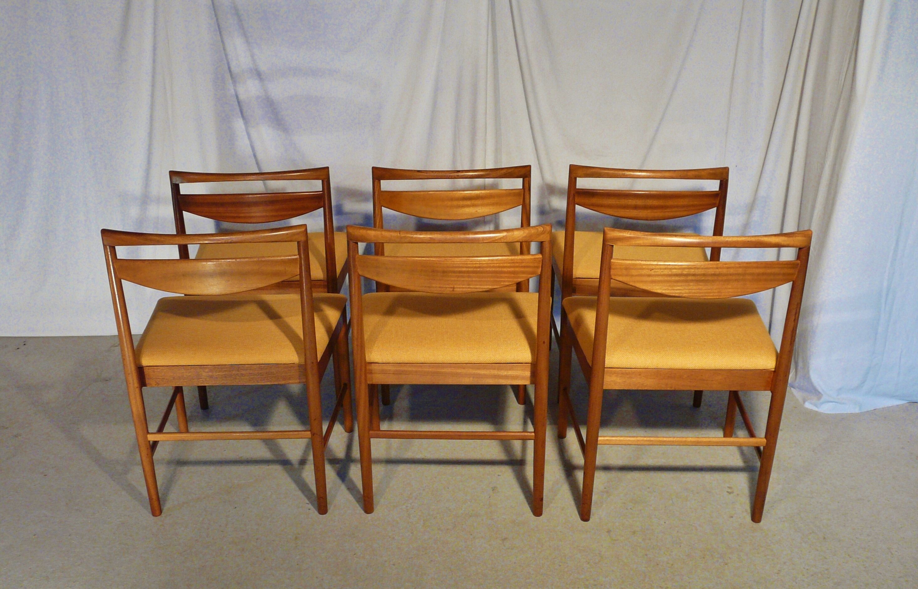 Extendable table set and six Scandinavian Teak Mc Intosh chairs
