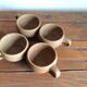 4 stoneware coffee cups