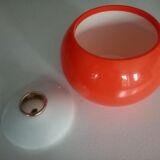 Bucket with 70s bottles