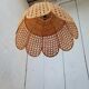 Openwork rattan suspension