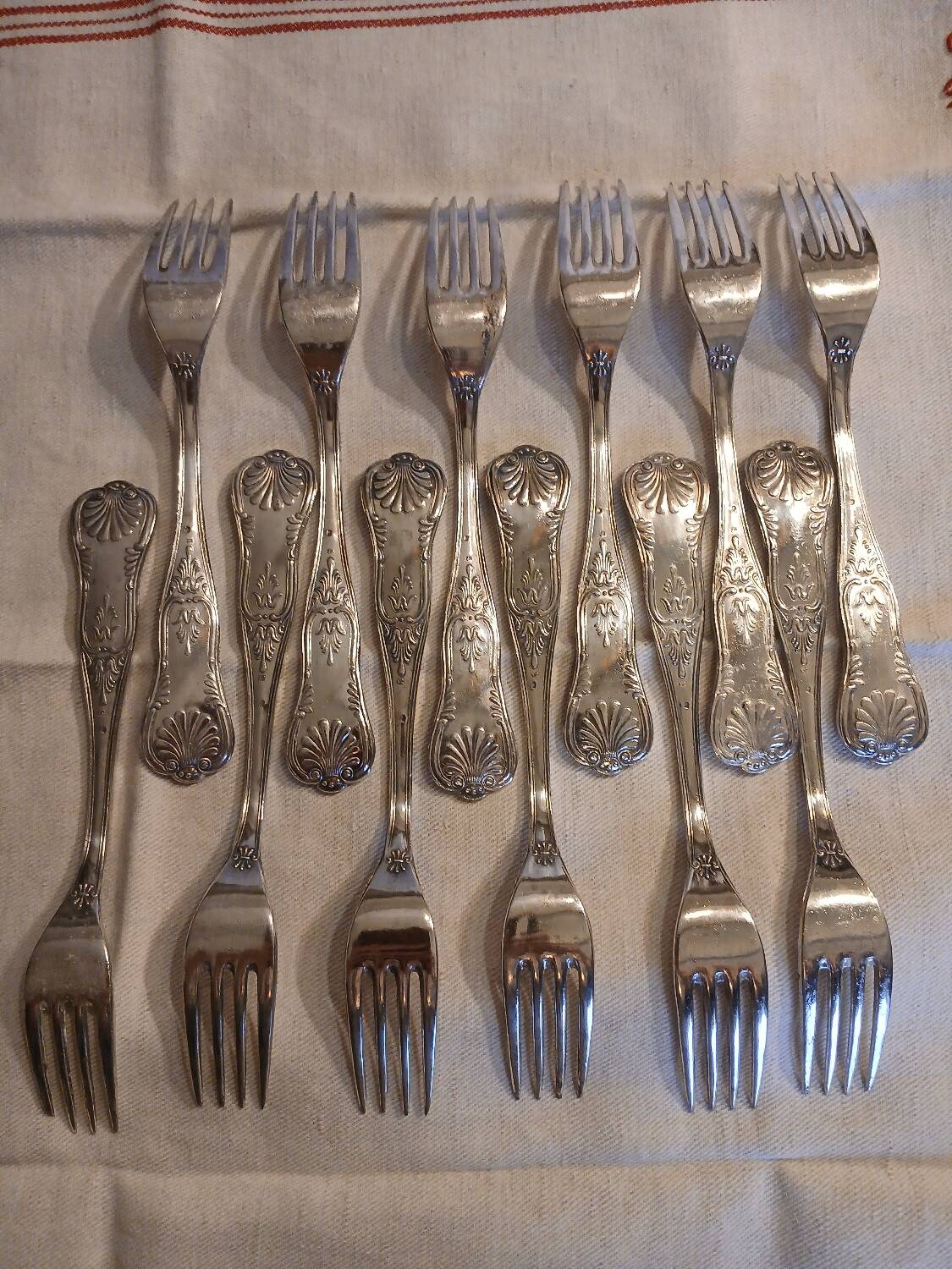Antique flatware set for 51 place settings