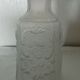 Moulded and frosted glass vase with Art Nouveau chimera decoration.