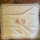 Antique white cotton pillowcase with crochet and monogram.