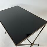 Pull-out tables in metal and glass
