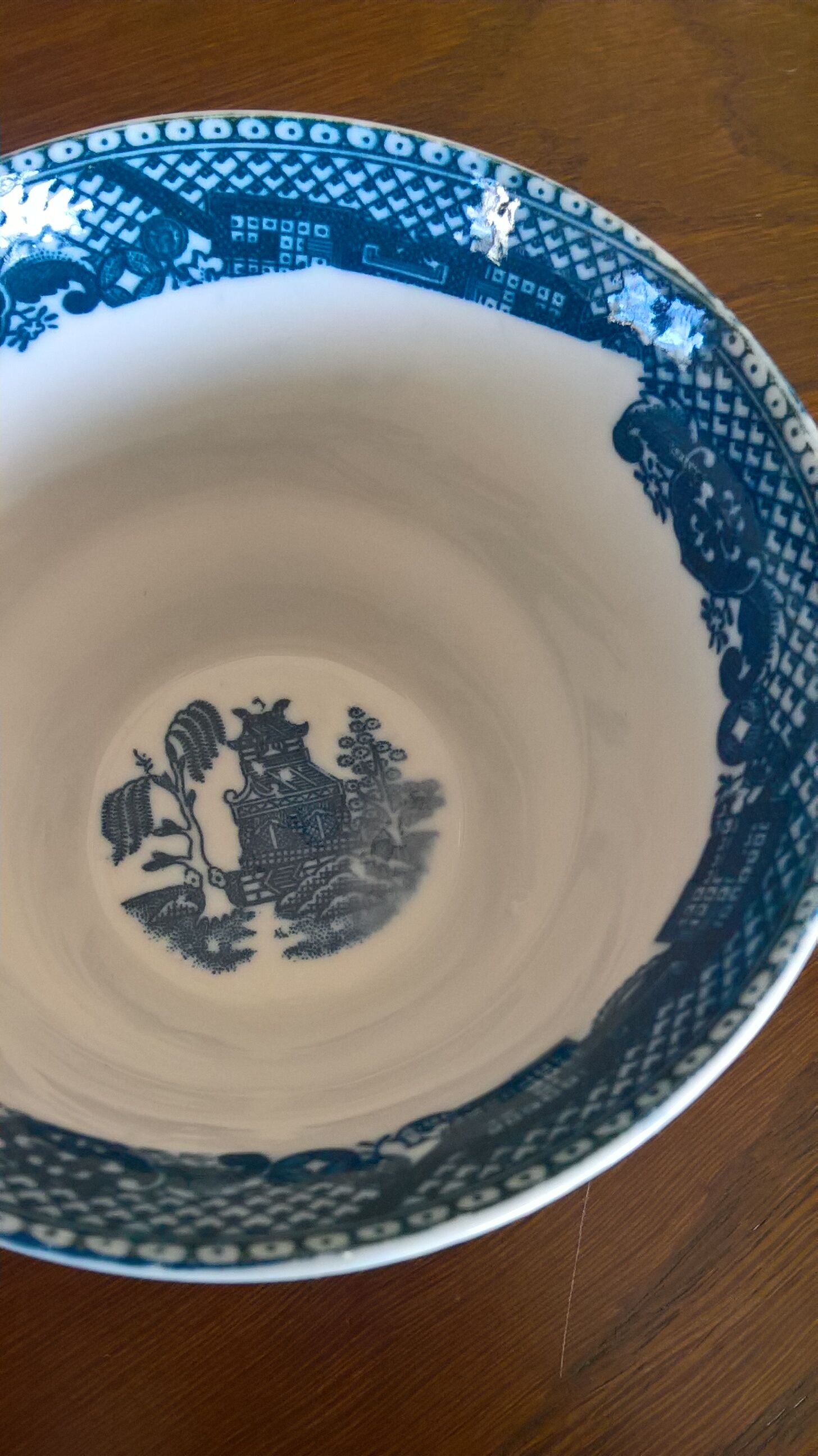 Two Blue Willow porcelain tea cups
