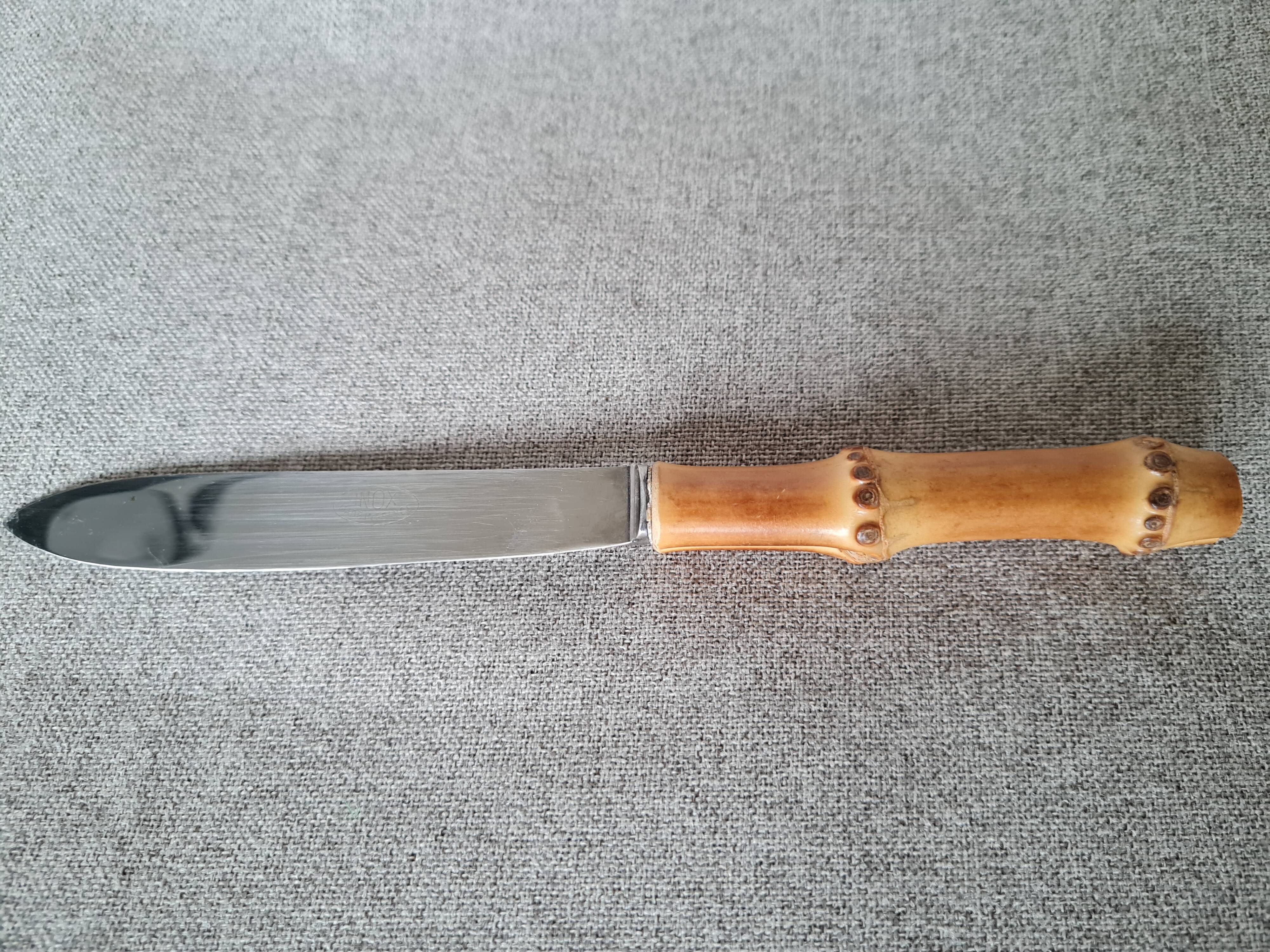 Bamboo handle cheese knife