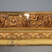Miroir ancien en bois sculpté et doré, Italie, XIXe siècle