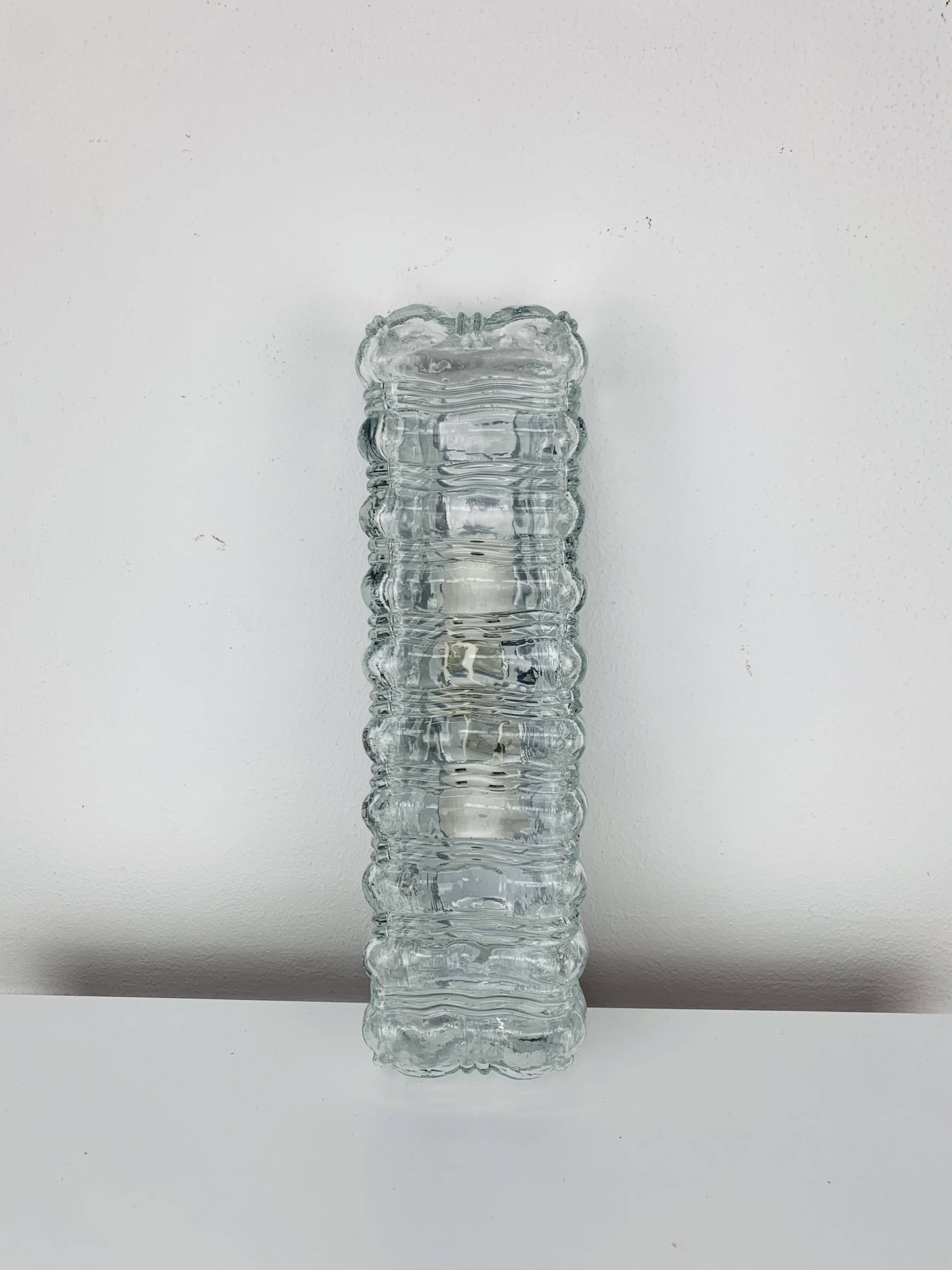 Rectangular wall lamp in molded glass and black metal from the 60s