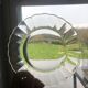 Duralex dessert plates in the shape of a daisy flower, transparent glass