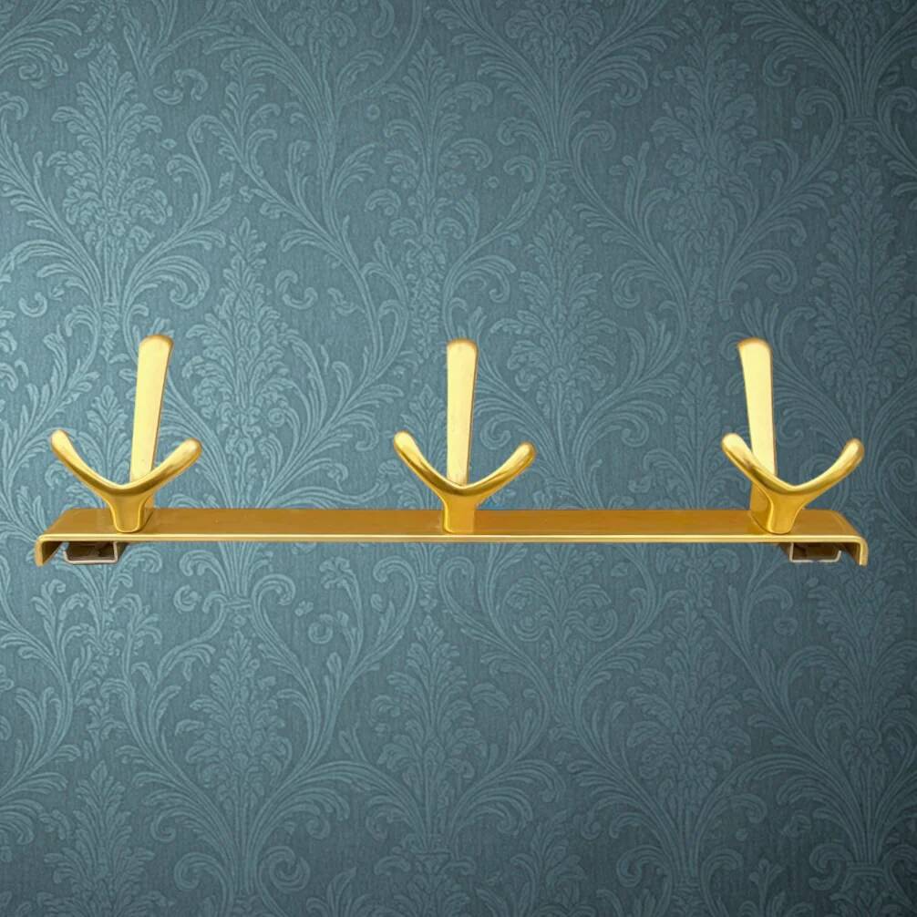 Vintage wall-mounted coat rack in anodised gold aluminium with 3 hooks from the 1970s.