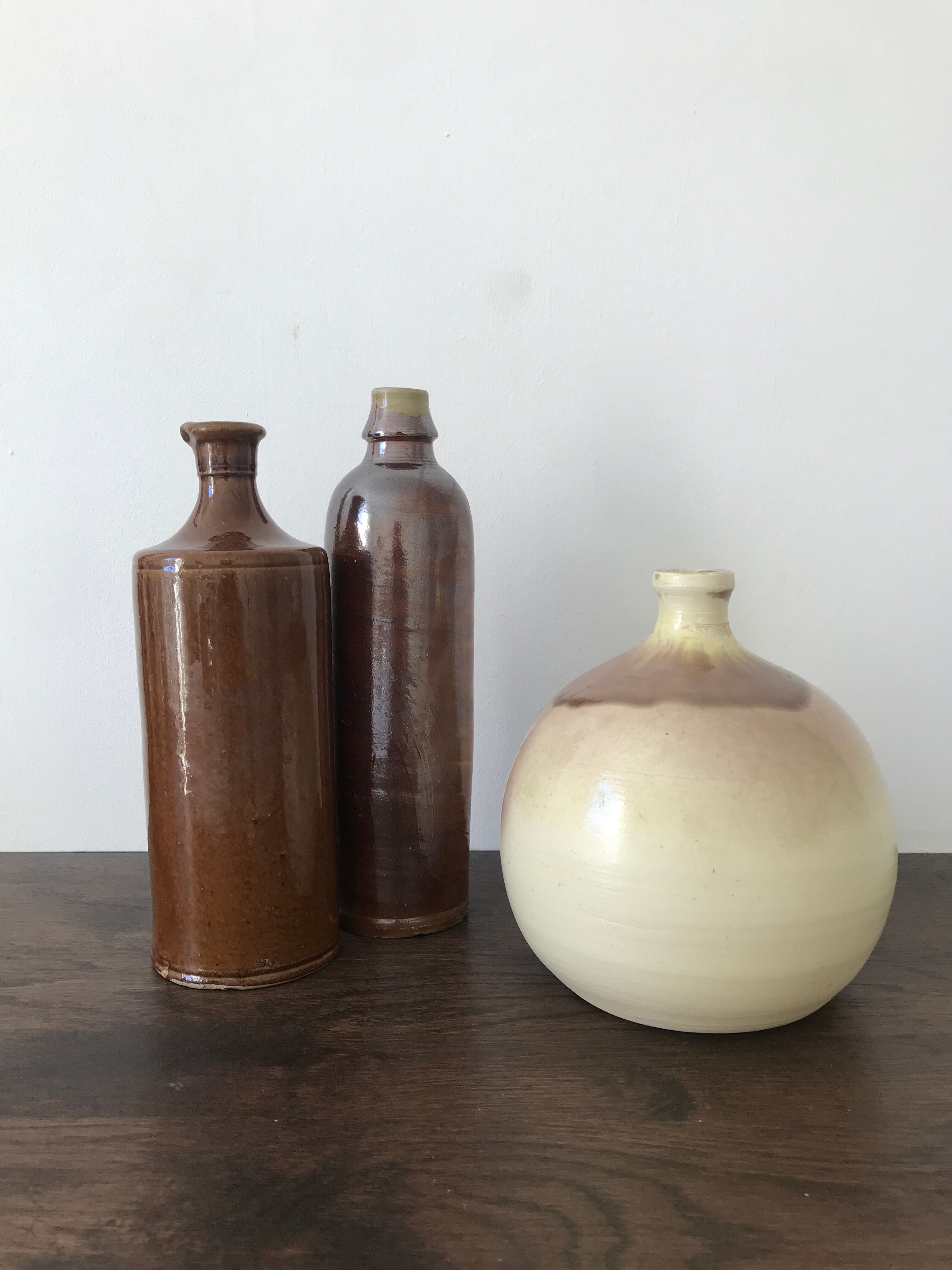 Pair of sandstone bottles