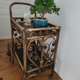 Bamboo and rattan dessert table in peacock style.