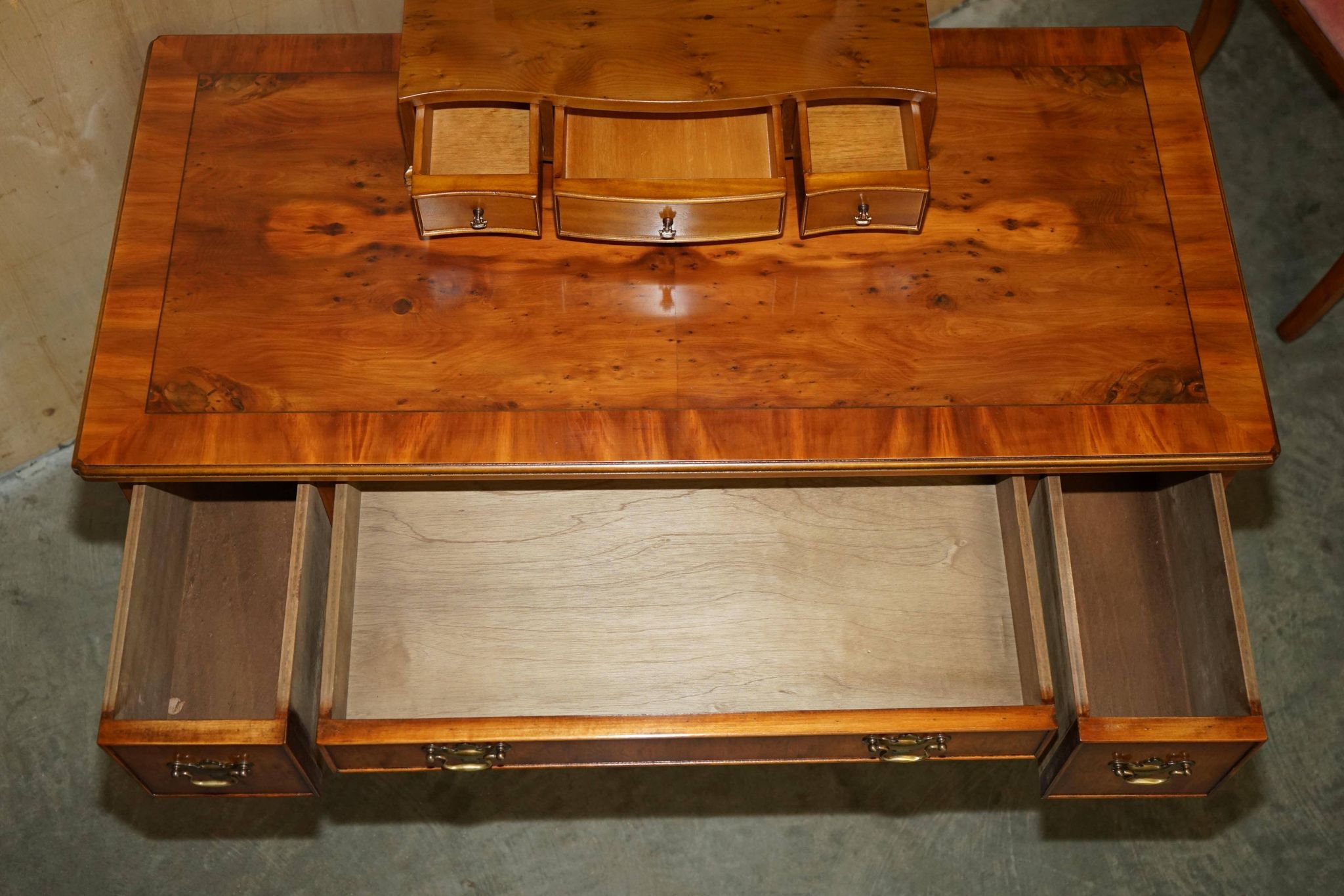 Vintage English walnut burr dressing table with mirror and chair.