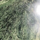 Vintage green sea marble and rosewood table from the 1970s.