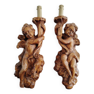 Pair of carved wooden sconces