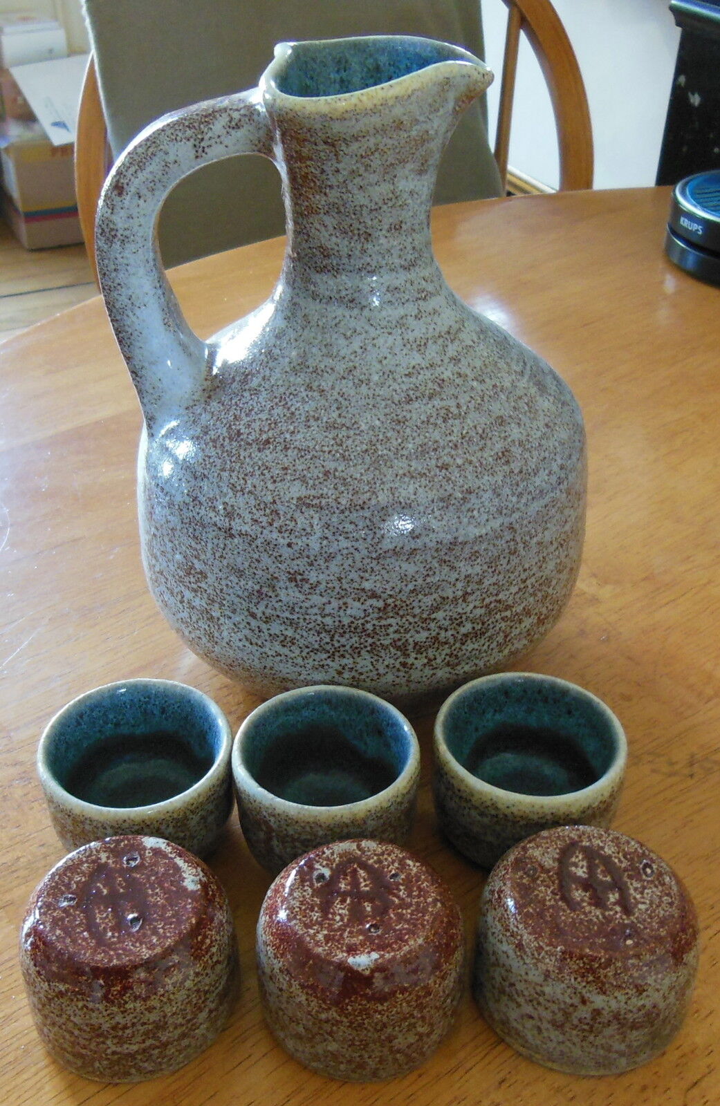Pitcher and its 6 small ceramic cups sign Accolay