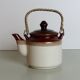Teapot in beige and brown stoneware