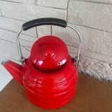 Old red enameled kettle