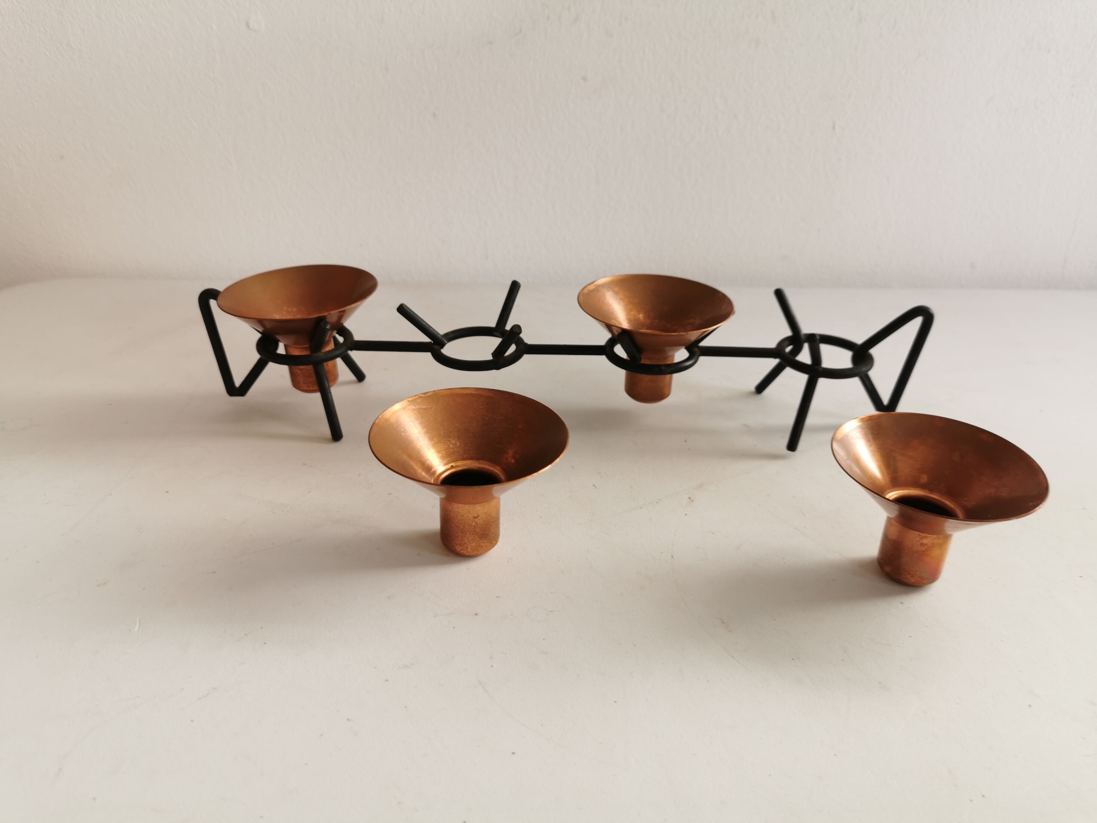 Older Danish designed candlestick, made of cast iron and copper.