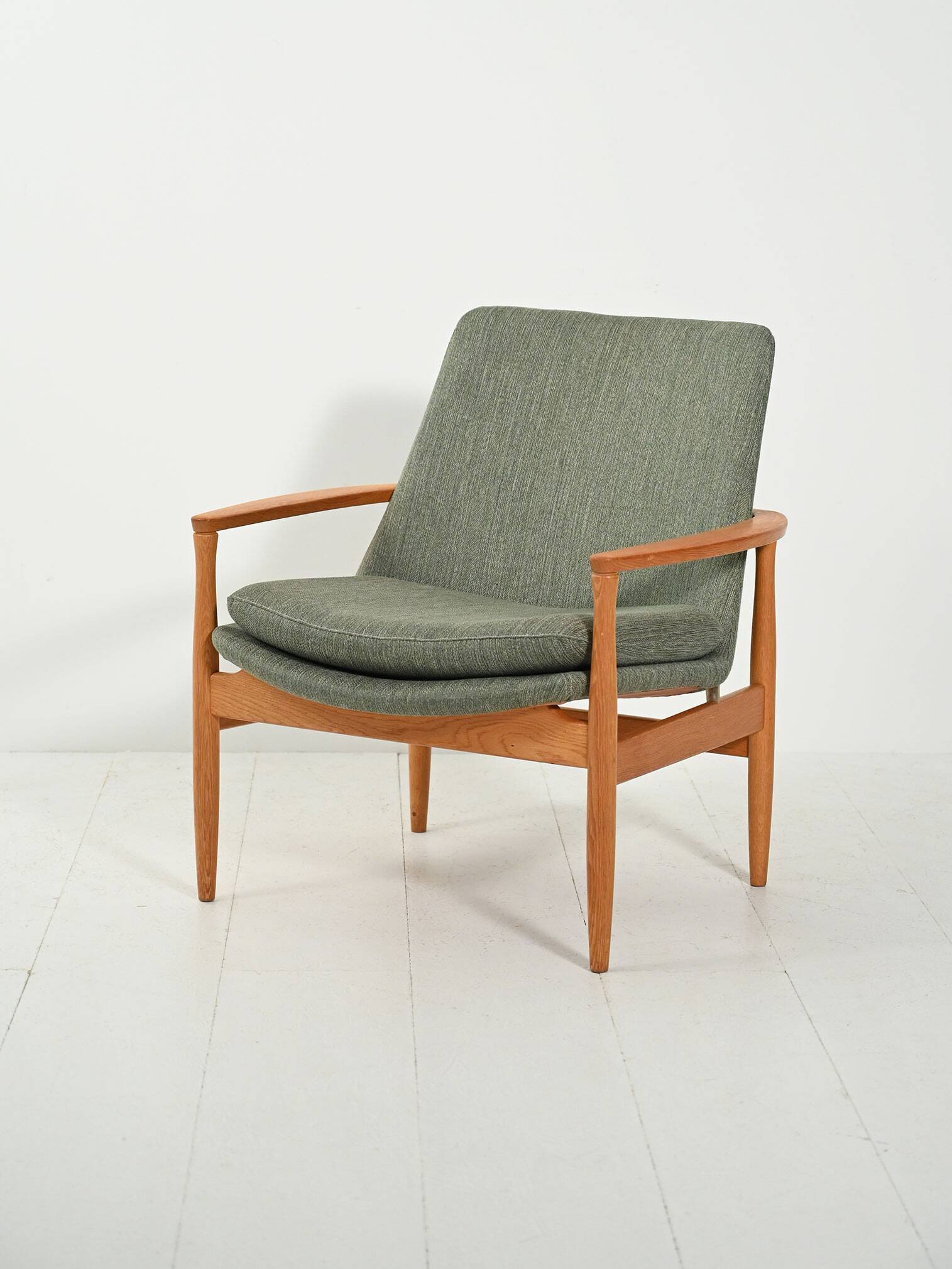 Scandinavian oak and sage-green wool armchair