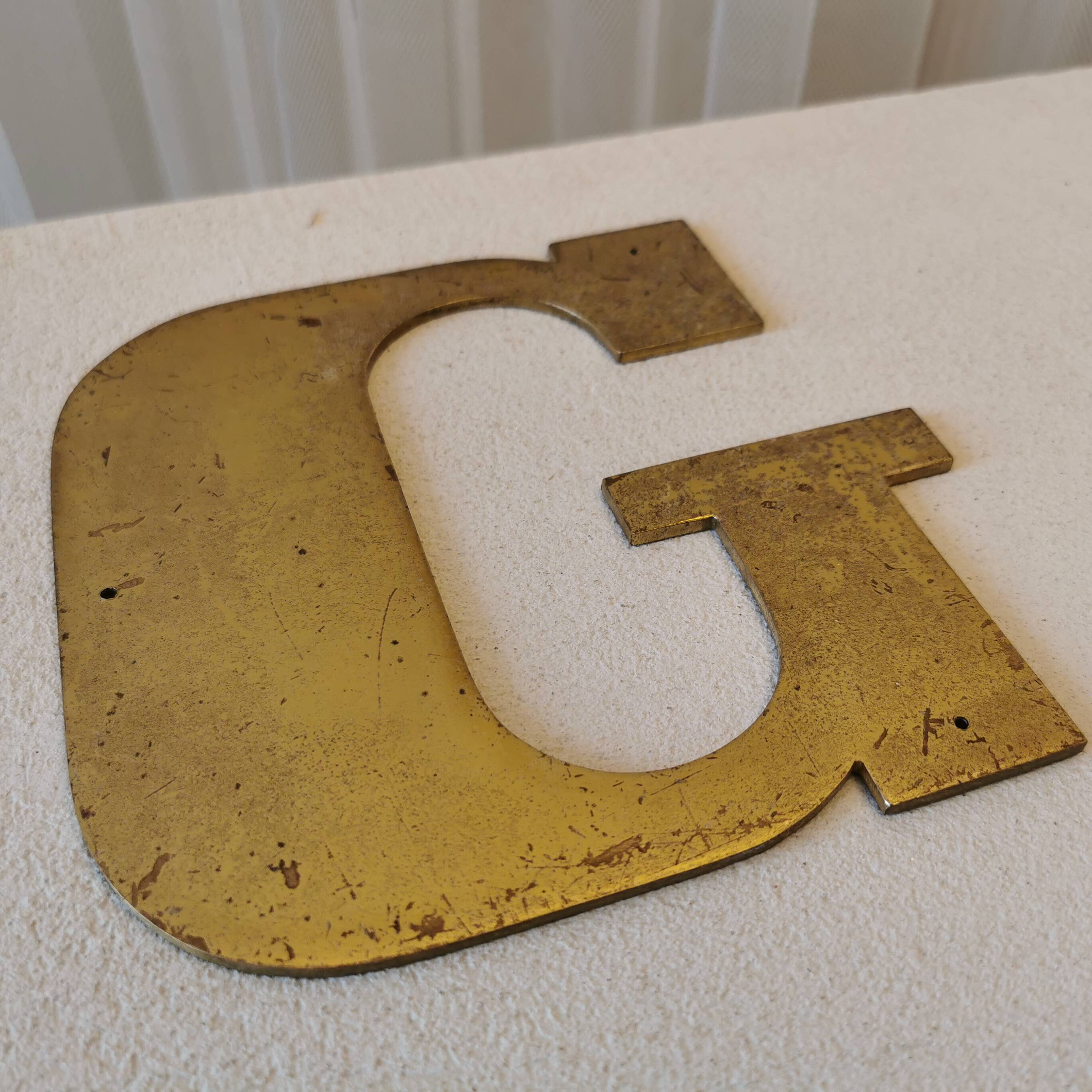 Letter "G" in brass