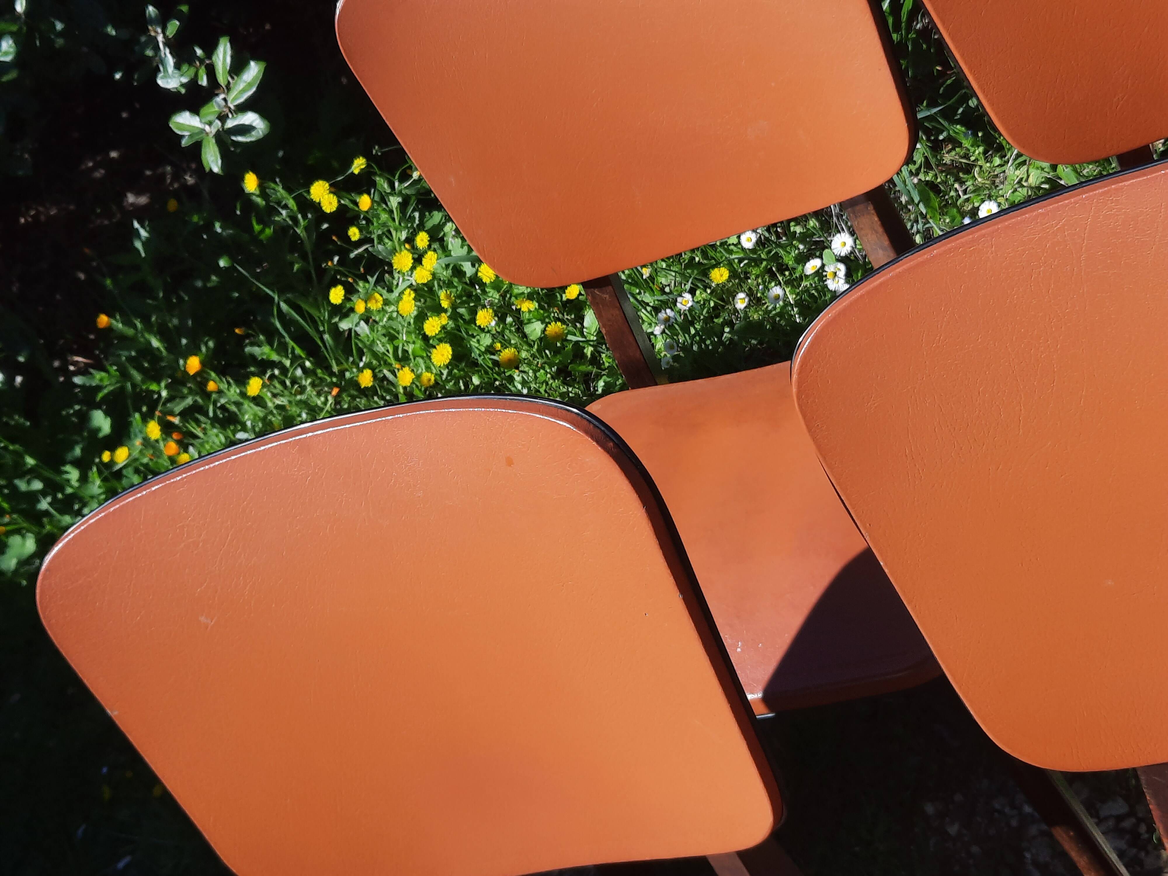 Set of 6 orange skai and wood chairs from the 60s