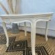Round coffee table with cane