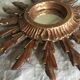 Miroir soleil en bois doré, 60
