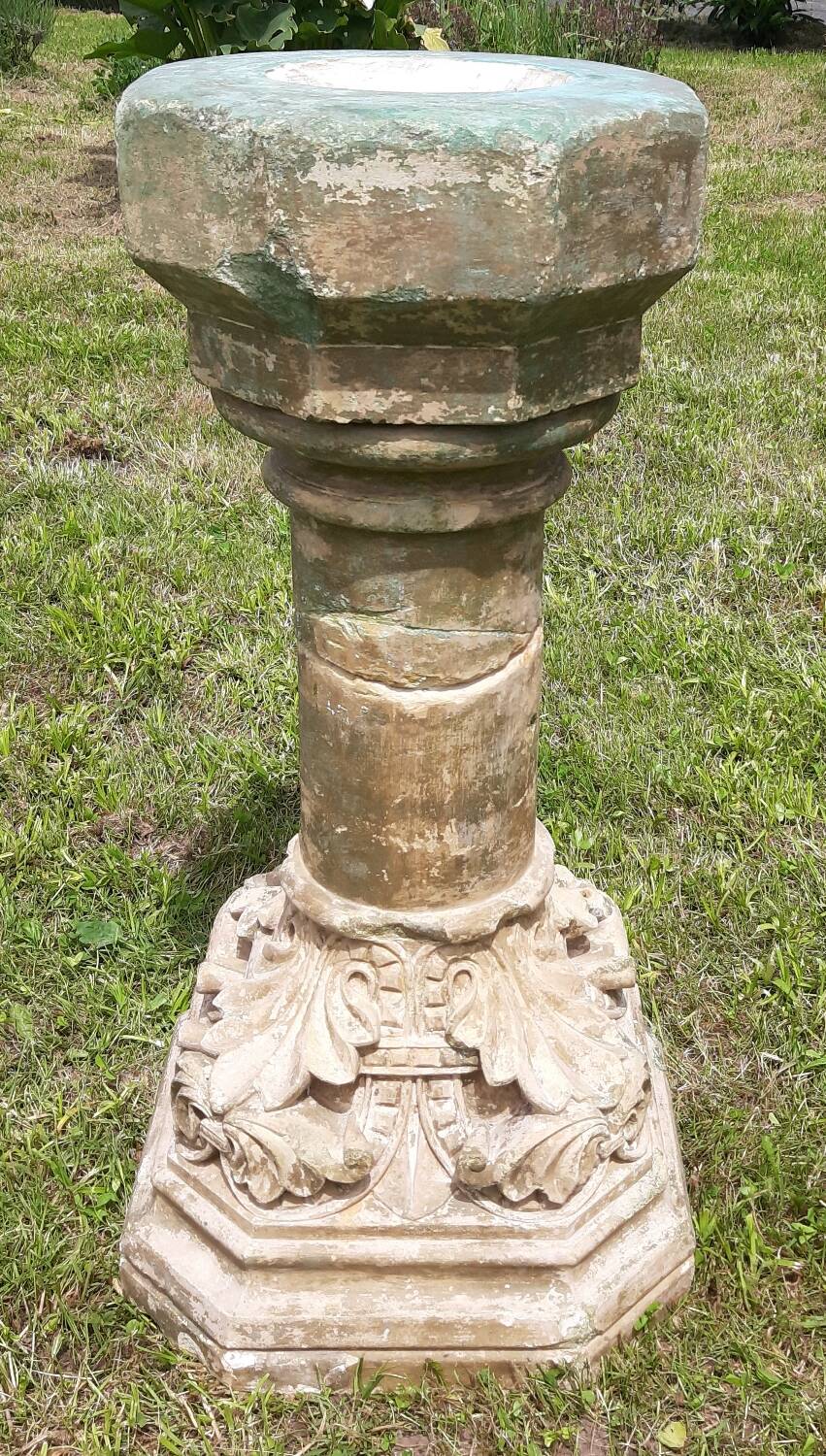 Holy water font on stone column (17th century)