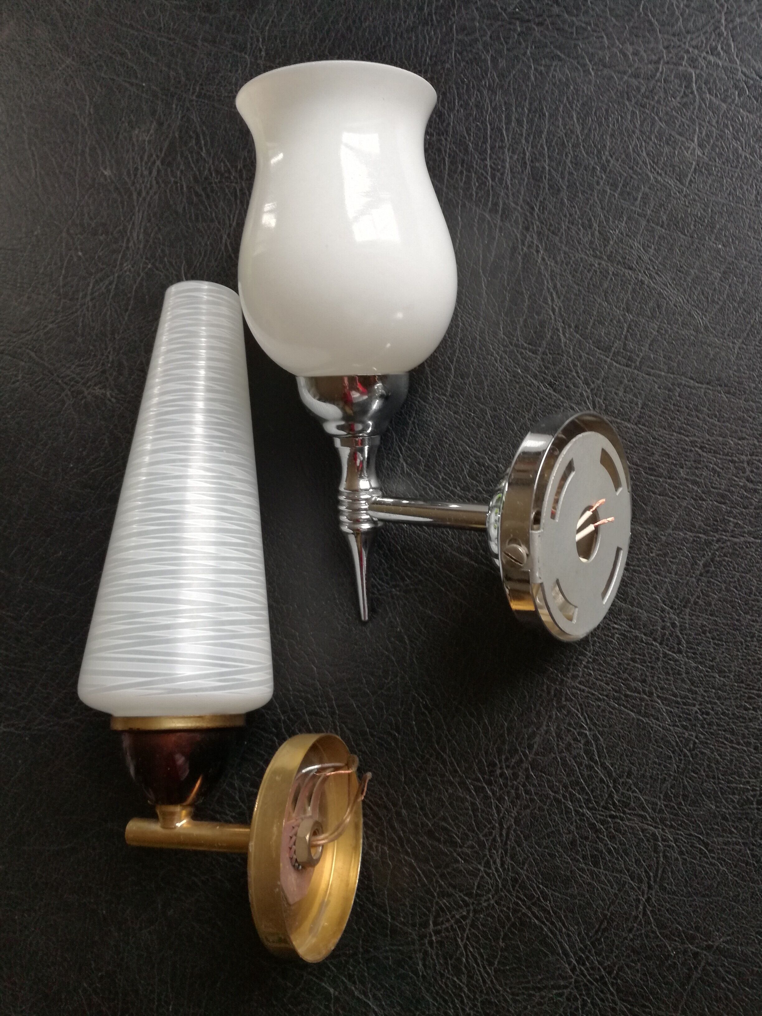 Mismatched sconces 1950