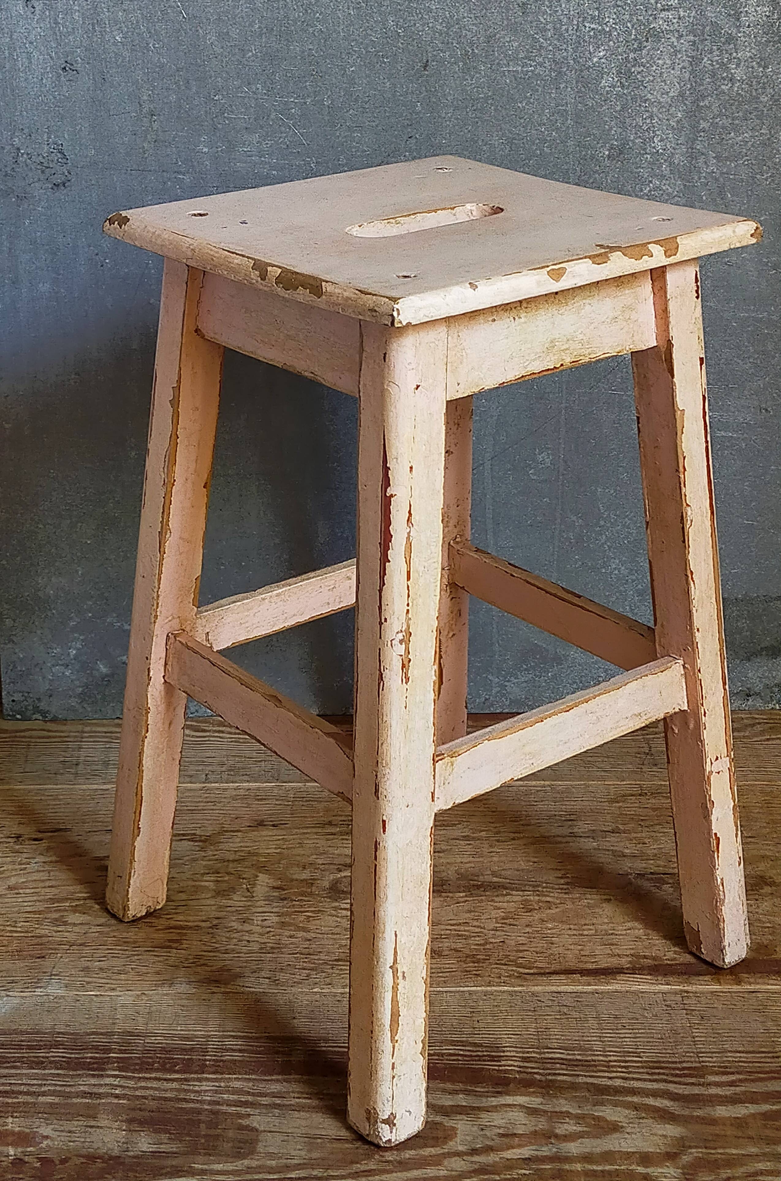 Antique workshop stool in patinated solid wood